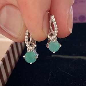 Silver earrings with emeralds